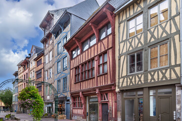 Obraz premium Medieval half-timbered houses in the old town of Rouen, France. Narrow cobblestone street view in historic city center