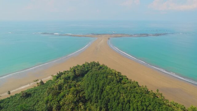 Marino Ballena National Park in Costa Rica, lush green forest meeting the ocean at Uvita Whale Tail.