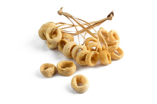 Lanting or Klanting is indonesian traditional snack. Made from cassava, salt,onion, spices and fried with coconut oil. Isolated on white background