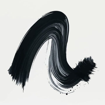 Abstract black ink brush stroke on white background.