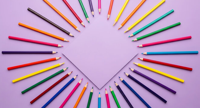 Radial sunburst of multicolored pencils around central purple paper on light violet background with copy space