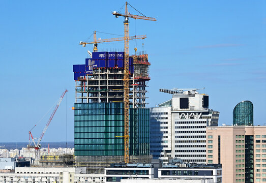 Warsaw, Poland, Europe - 04.2026 : At crossing of Grzybowska str and Pope John Paul II Av. for 30 years was Atrium building, after its demolition construction of new building called Upper One began