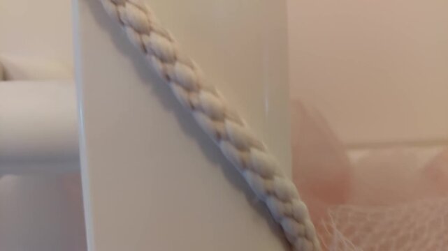 Detail of pink shower sponge texture and white bathroom heater
