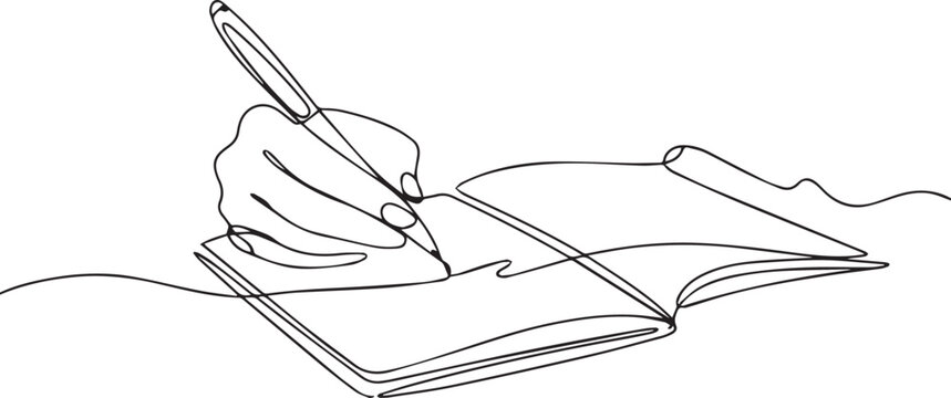 A hand holding a pen writing in an open book on a white background