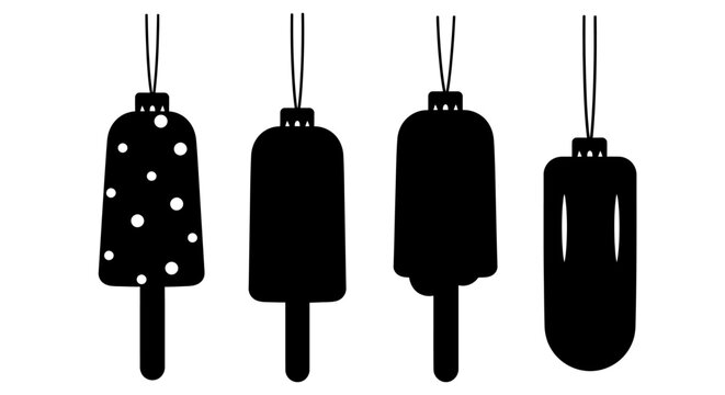 Four black hanging ice cream popsicle silhouettes with one polka dot design on white background