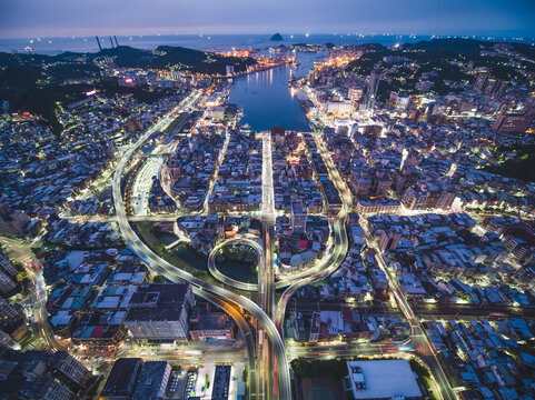 Aerial View of Keelung City Skyline - Port city concept image. Panoramic cityscape birds eye view use the drone in evening, major port city situated in the northeastern part of Taiwan.