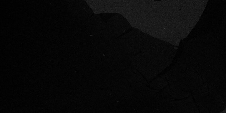 Full black background with faint analog noise and soft glitch flicker, retro VHS scan feel with minimal interference and subtle film dust texture