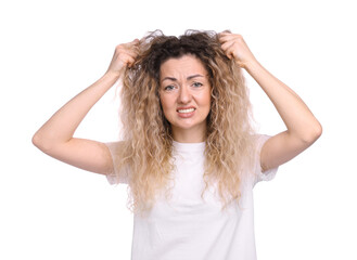 Fototapeta premium Unhappy woman with tangled hair on white background