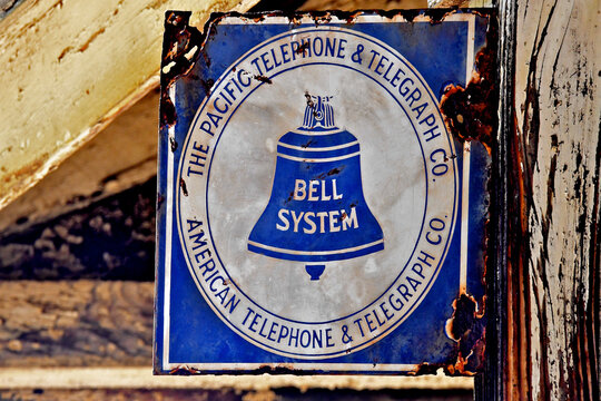 1940&rsquo;s vintage Bell Telephone sign often meant that a telephone was available for use inside country store when individual homes didn&rsquo;t have one.