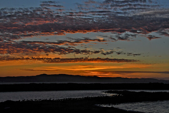 Sunset over San Francisco Bay with the Santa Cruz Mountains on the horizon 