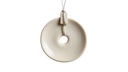 Smooth polished ivory jade bi disc pendant with cord, isolated on transparent background © Roxana