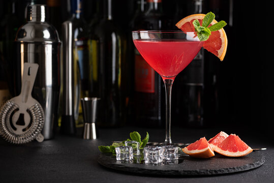 Martini Fiero Cocktail with Grapefruit and Mint. Elegant Mixology Scene