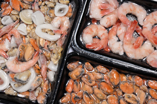 Plastic packages with seafood