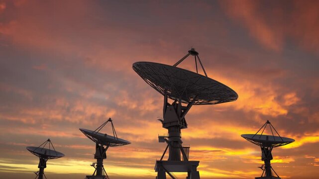 radio telescope at sunset