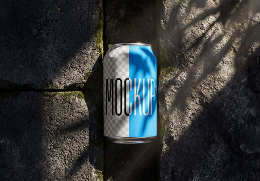 Aluminum Beverage Soda Can Mockup Between Rocks with Natural Sunlight Shadows