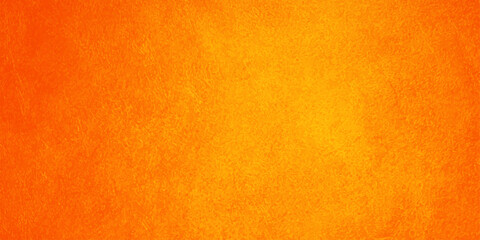 Fototapeta premium Vibrant orange and yellow textured background with subtle vignette and parchment paper grain for creative graphic design