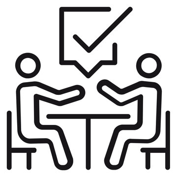 Job interview and successful business meeting vector icon illustration. Two people sitting at a table having a conversation with a checkmark speech bubble symbol, representing agreement and success.
