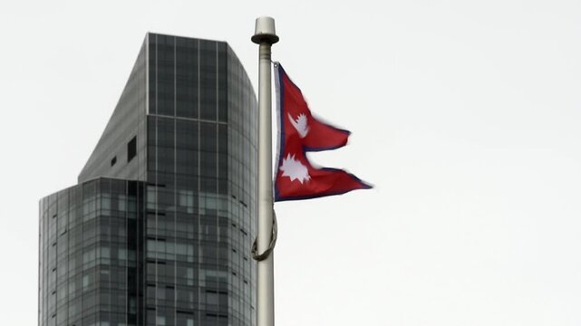 The Nepalese flag on a flag pole at Toronto City Hall&rsquo;s Nathan Phillips Square.