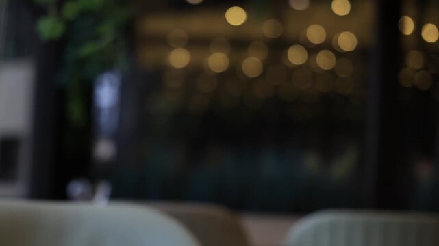 The background is blurred with bokeh for the inscription.