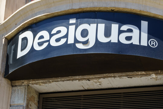 Barcelona, Spain - August 1, 2021.Logo and facade of Desigual, a Spanish company in the fashion industry characterized by its uniqueness
