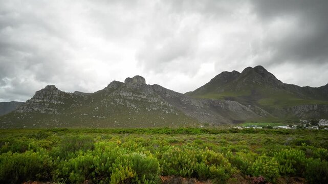 Stormy Mountain Landscape Near Cape Town, Dramatic Overcast Sky With Rolling Clouds, Lush Green Fynbos