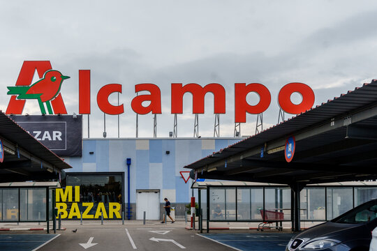 Barcelona, Spain - August 1, 2021. Logo and facade of Alcampo is a distribution company owned by the French group Auchan