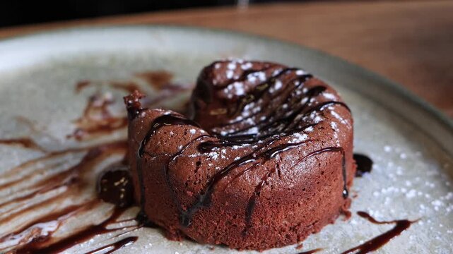 Delicious chocolate fondant dessert with ice cream.