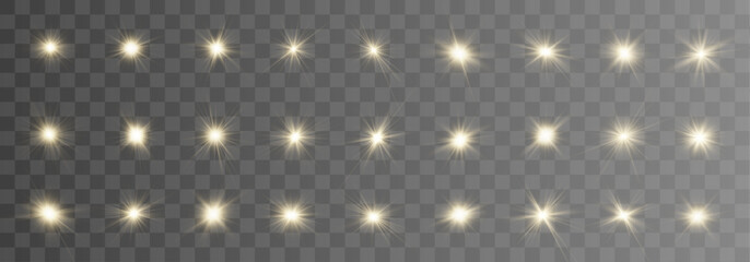 Naklejka premium Shimmering golden stars set floats on dark abstract background. Bright spark effects add magical festive glow. Vector star collection for artwork use.