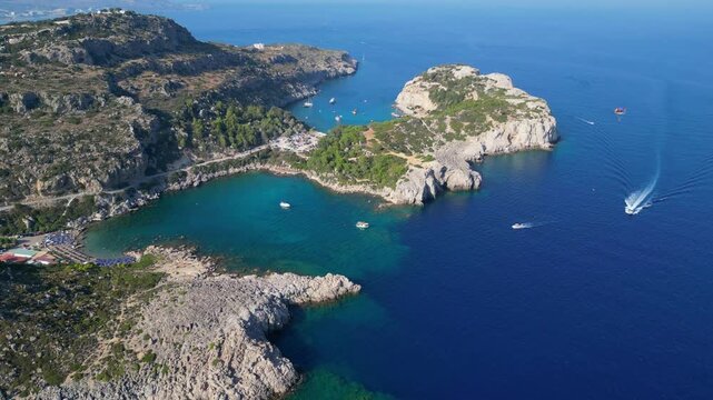 Aerial view of Anthony Quinn Bay with turquoise water and rocks in Rhodes