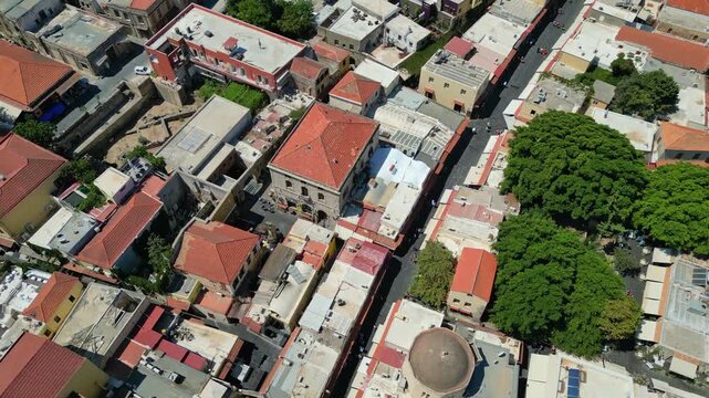 Aerial view of the medieval Marine Gate towers and Hippocrates Square in Rhodes Old Town