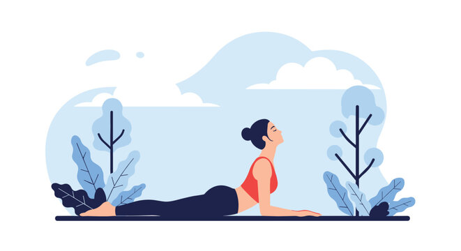 Peaceful woman practicing a cobra yoga pose on a mat in a serene park setting with trees and a cloudy blue sky background.