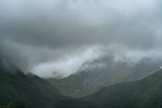 Clouds over mountains and valley