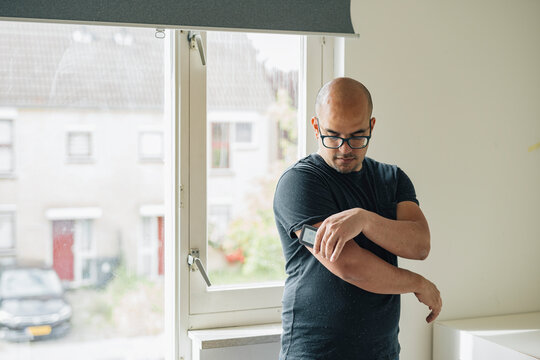 Diabetic measuring sugar levels. 