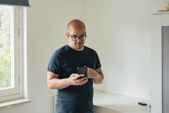 Diabetic man with cell phone. 