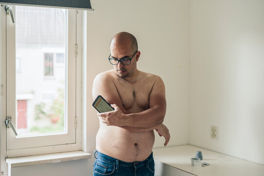 Diabetic measuring sugar levels. 