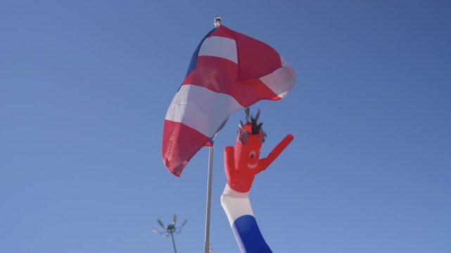 Puerto Rican Flag flying in the air 