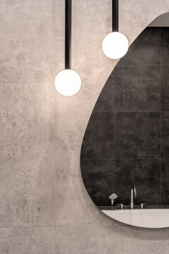 Bathroom in contemporary style with tiled walls