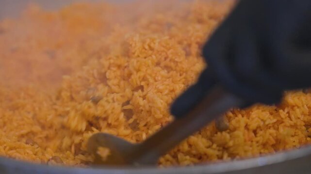 Fried Rice being stirred in a large pot