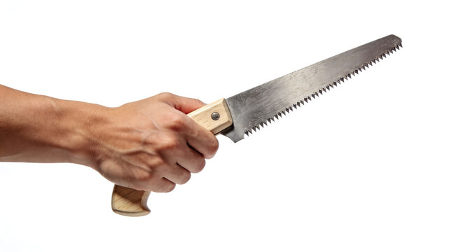 Man's hand holding a small hand saw with a wooden handle, isolated on white.