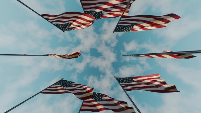 American flags form a frame in the blue sky on Memorial Day