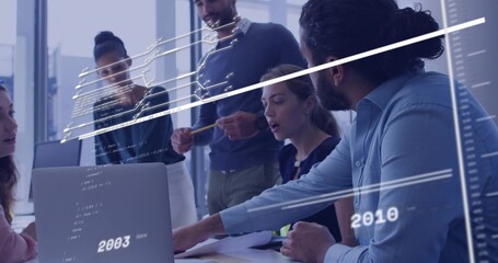 Collaborating five professionals in business-casual at office table, with laptop and code overlays © vectorfusionart