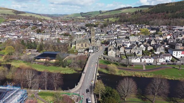 Aerial view of the historic Tweed Bridge with Peebles town and church in the background