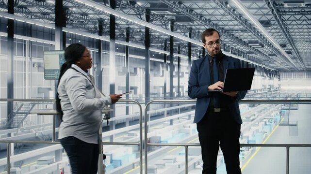 Trialing silicon wafer materials, microchips and man with coworker in industrial plant. Optimizing photolithography process, semiconductor substrate and managers review design specifications, camera A