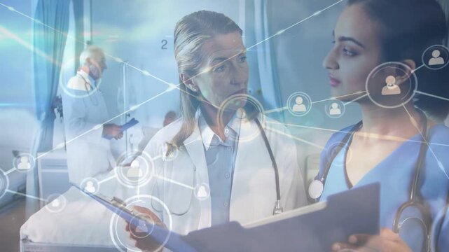 Opening blue folder, Dr white-coat and nurse blue scrubs reviewing chart for care in ward, overlay