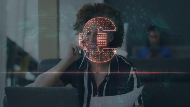 Talking man in dark striped shirt holding phone, paper near laptop at home, with euro overlay