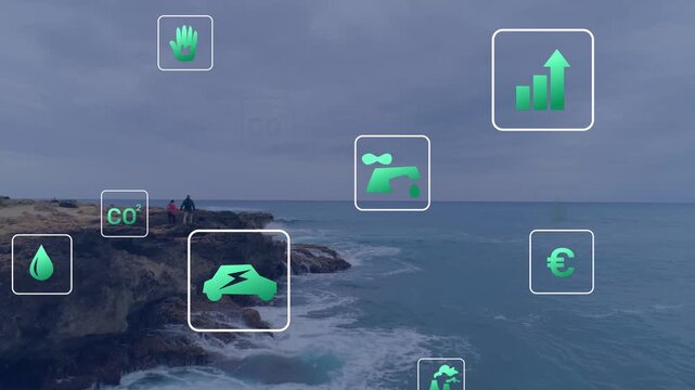 Floating green icons entering ocean urging duo in red coat leaning watching from cliff, copy space