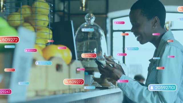 Sipping woman in denim jacket tapping smartphone at cafe counter with floating UI tags, copy space
