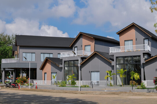 he modern architectural exterior of the Ayola Signature Ocarina Batam hotel.