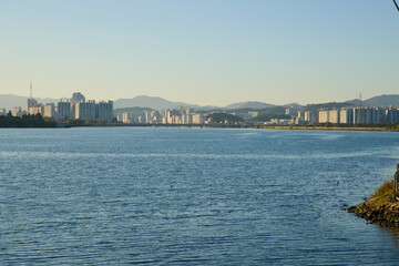 Fototapeta premium Skyline Across the Taehwa River