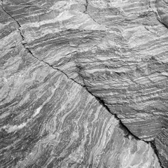 Naklejka premium Black and white stone surface. Rock texture background